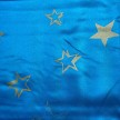 TESSUTO RASO CARNEVALE AZZURRO STELLA ORO