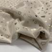 Vellutino beige con stampe natale oro